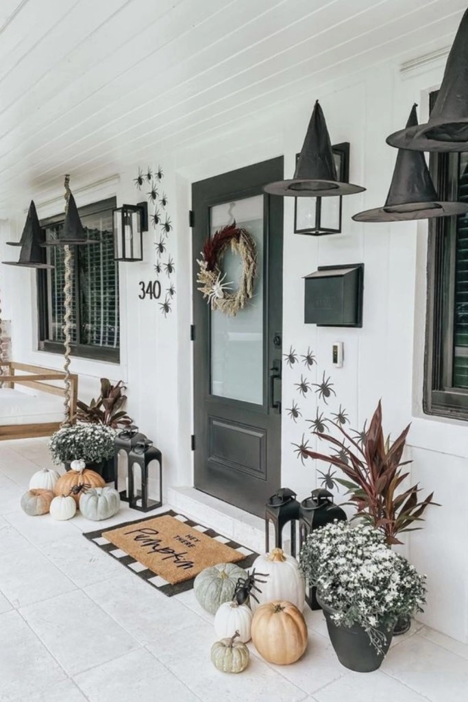 Rustic Fall Porch With Witch Hats and Pumpkins-halloween front porch ideas-loves from bet