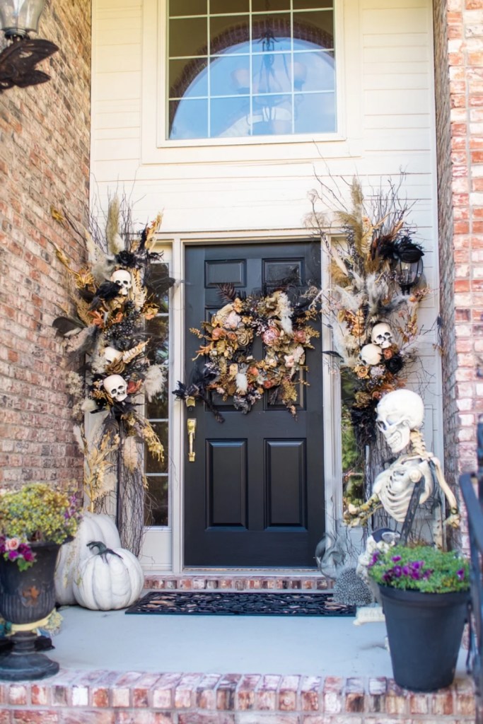 Skeleton and Skull-Adorned Gothic Porch Entrance-halloween front porch ideas-loves from bet