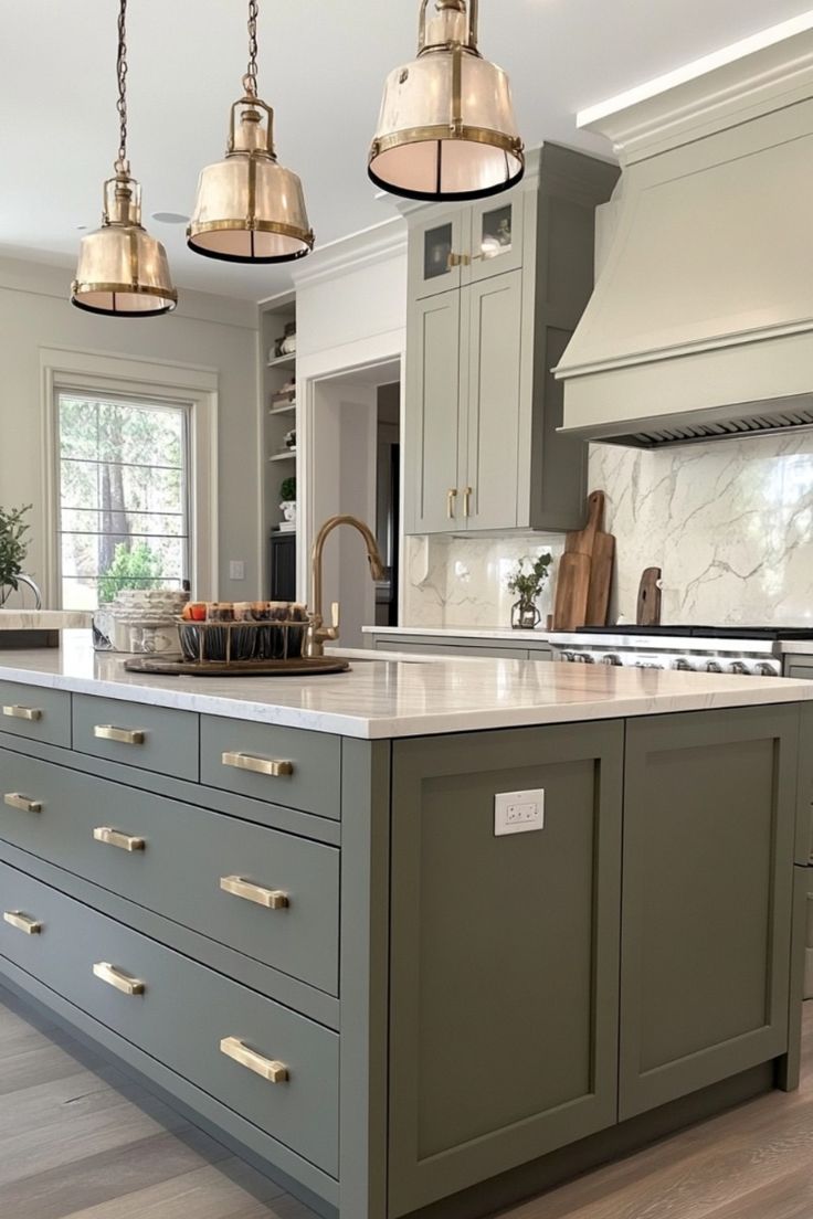 green kitchen island with three pendant lighting