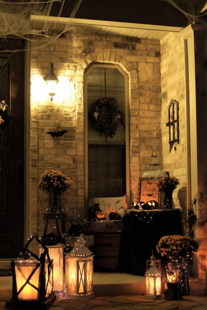 Cozy Halloween Porch Table With Bats and Spider Webs-halloween front porch ideas-loves from bet