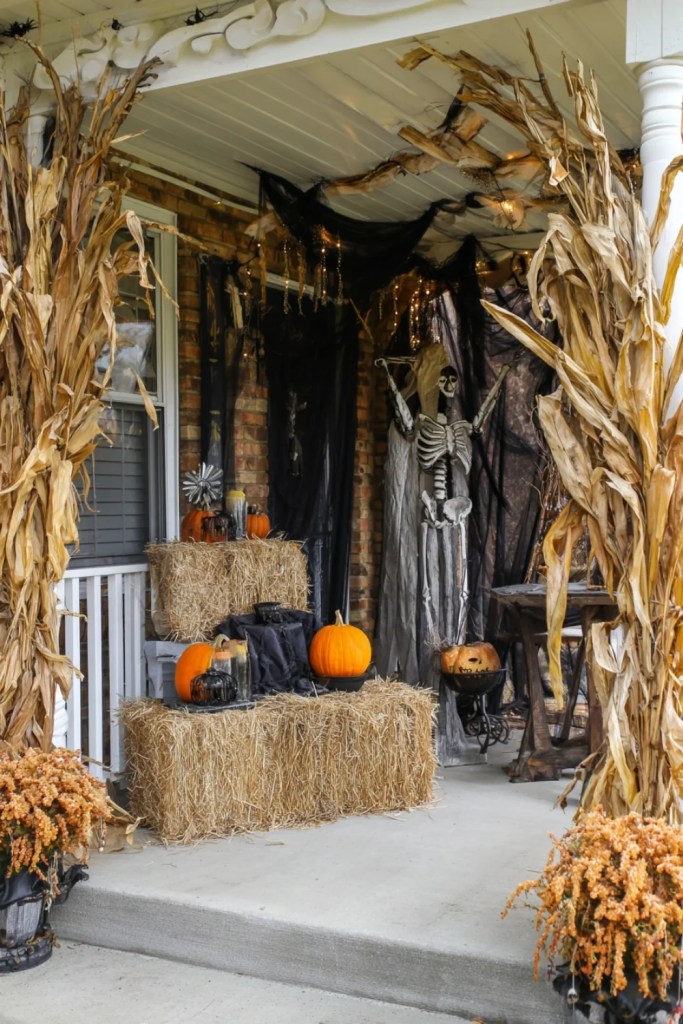 Cornstalks, Pumpkins and Skeleton Hay Bale Display-halloween front porch ideas-loves from bet